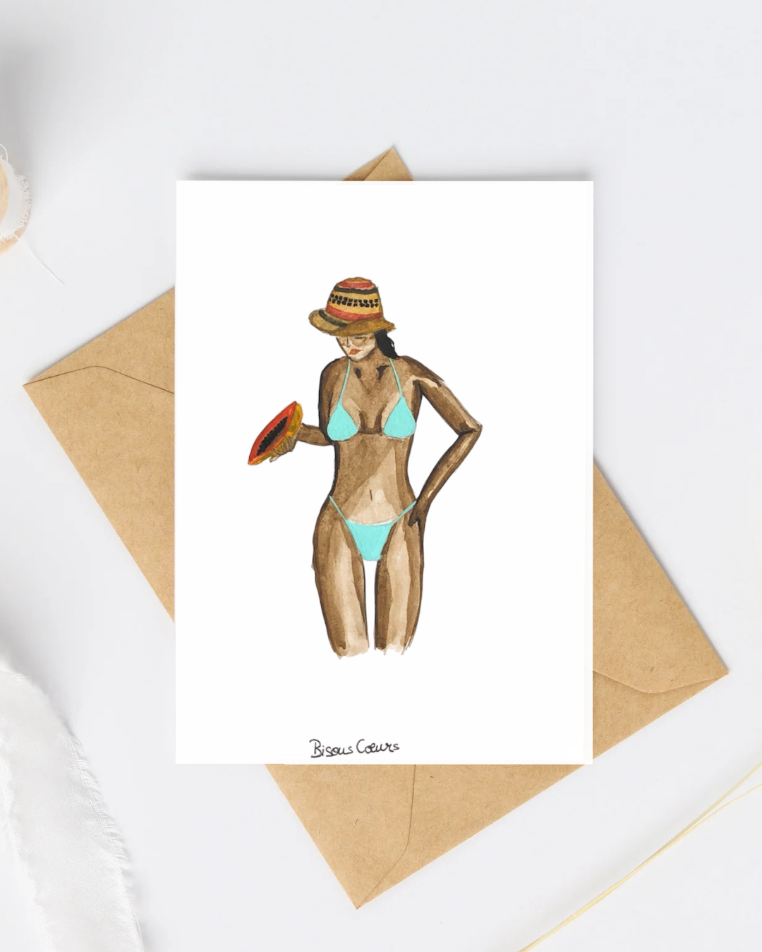 Carte postale fille en bikini papaye a la main